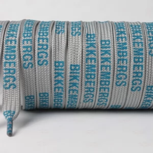 Шнурок плоский сірий з написом BIKKEMBERGS синім, ширина 10мм.  довжина 120см.