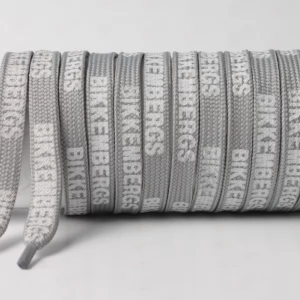 Шнурок плоский сірий з написом BIKKEMBERGS білим, ширина 10мм.  довжина 120см.