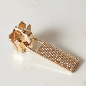 Бігунок тип 5 язичок +1247 для тракторної блискавки, GOLD, корона шх, 100шт.